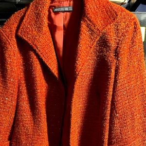 3/4 sleeve jacket with gold threads running through it.